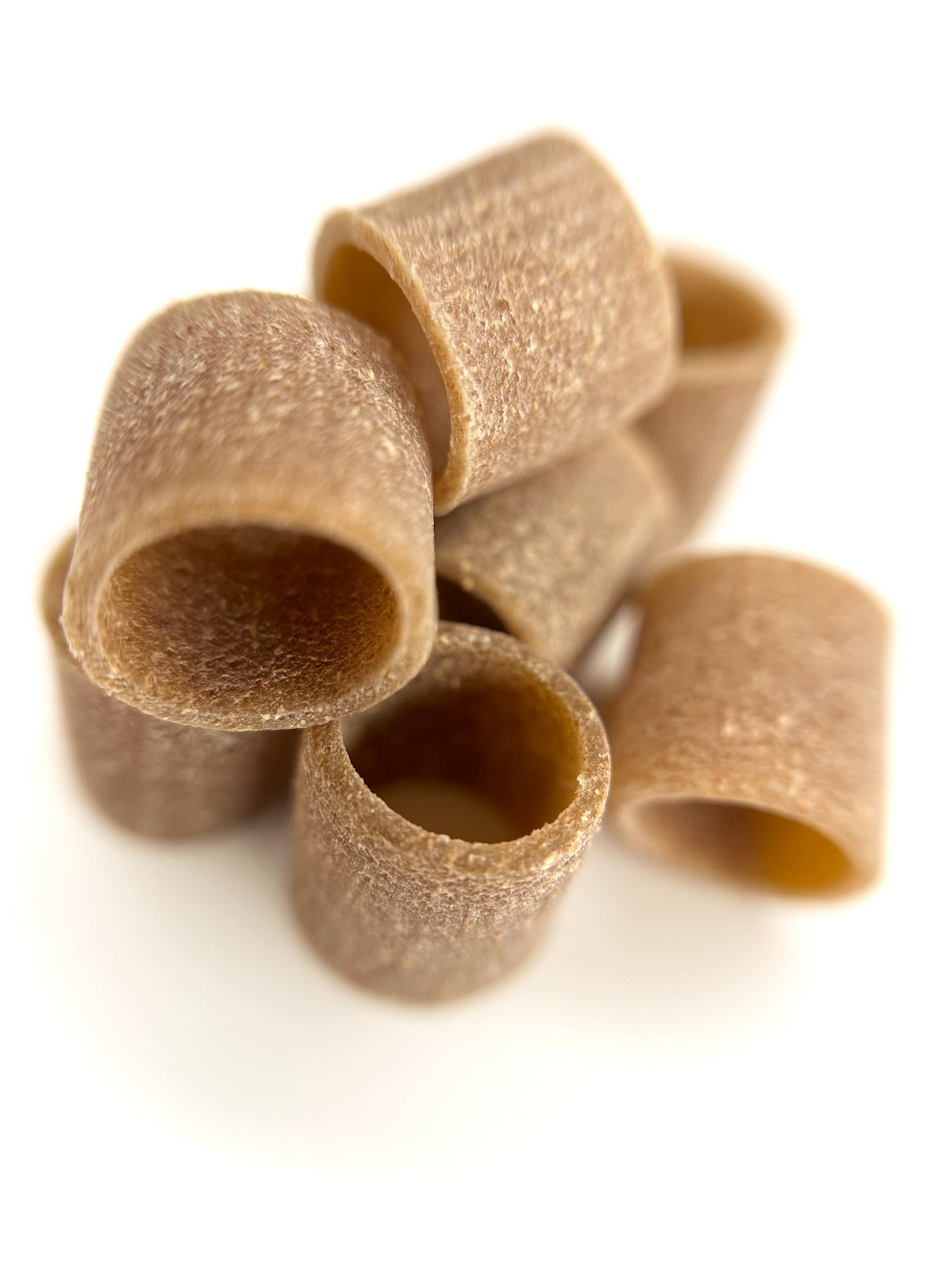 individual pieces of organic wholegrain einkorn tubetti pasta from carleschi