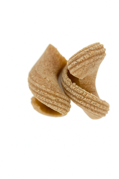 individual pieces of organic wholegrain einkorn gigli rigati pasta from carleschi 