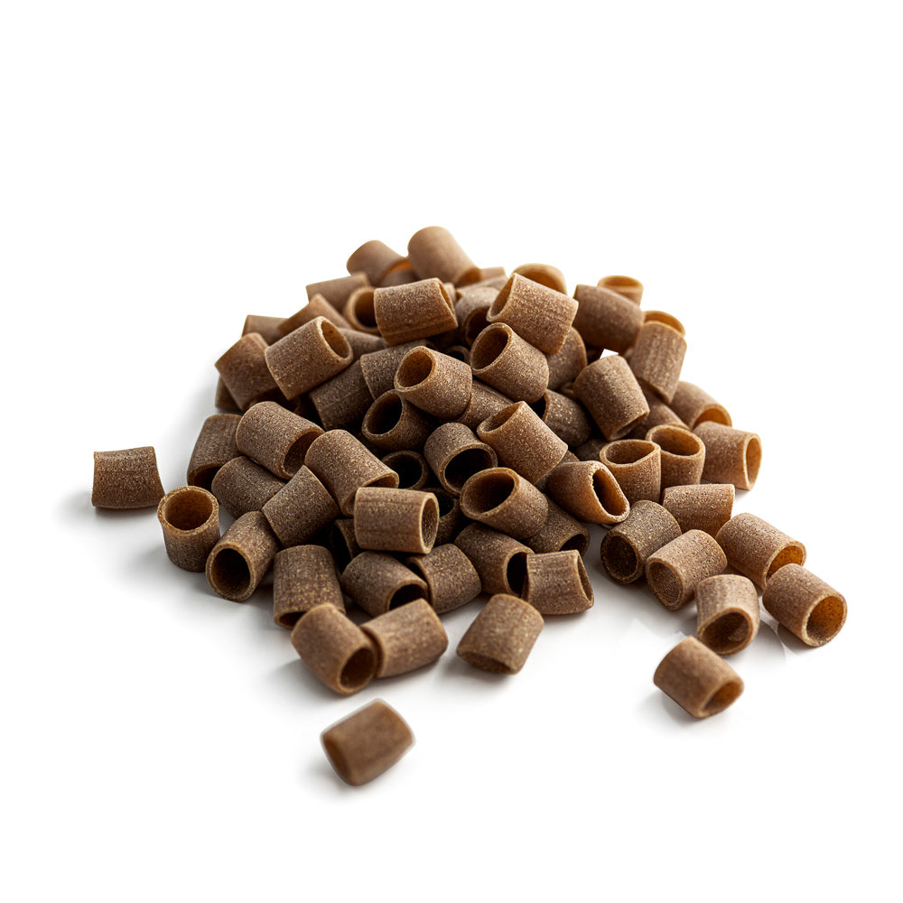 small p[ile of organic wholegrain einkorn tubetti pasta from carleschi 
